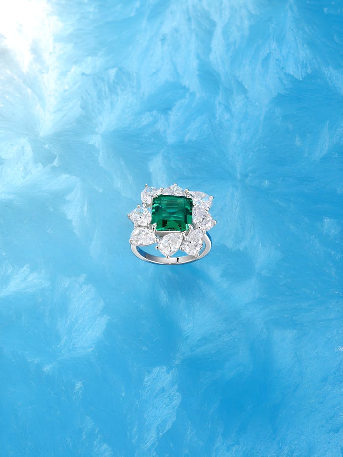 Elegant emerald-cut ring in Dubai with sparkling diamonds and refined luxury.